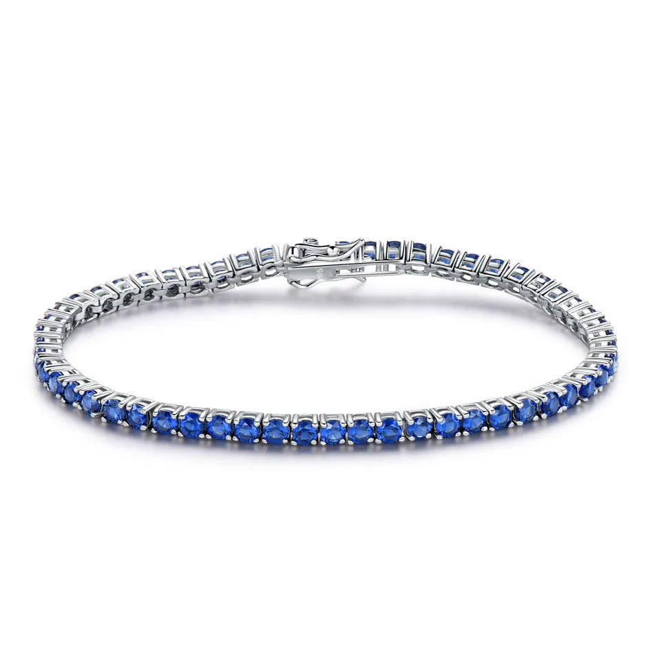 925 sterling silver nano sapphire tennis chain bracelet with drop shape stones on white background