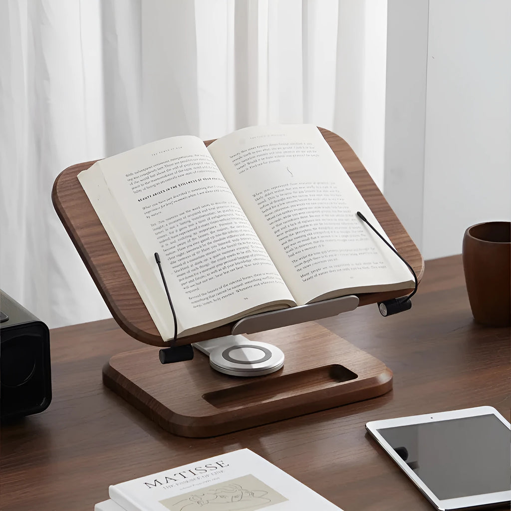 Walnut-coloured solid wood reading rack with an adjustable angle, holding a book.