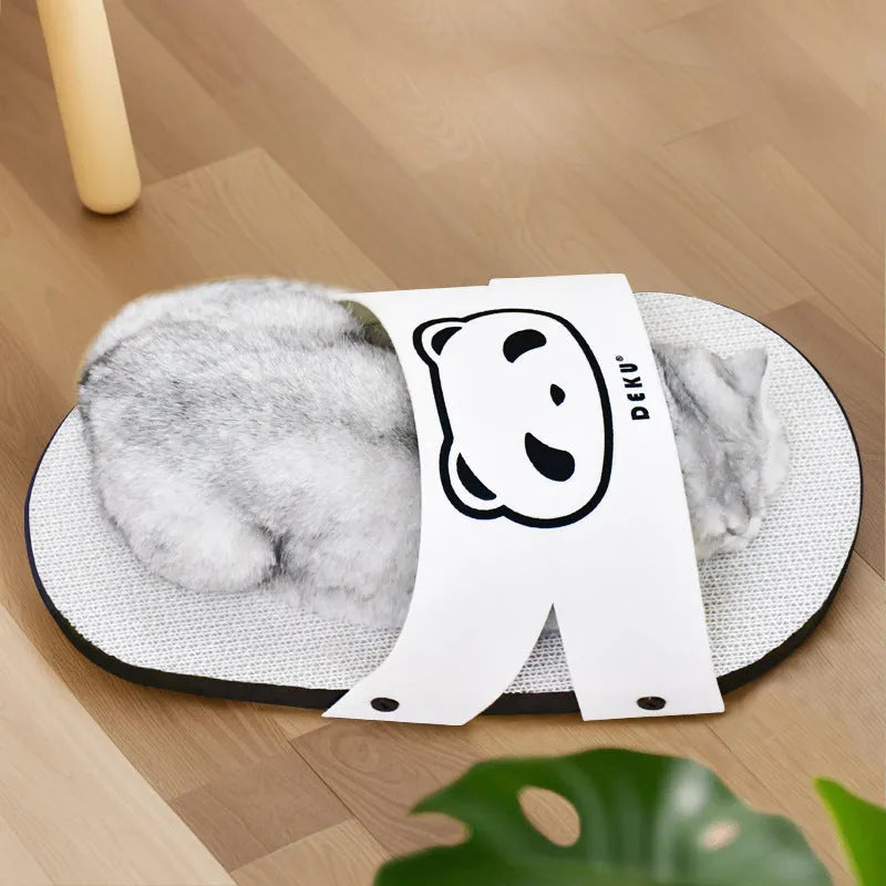 White corrugated paper cat scratch board in slipper style design on flat surface