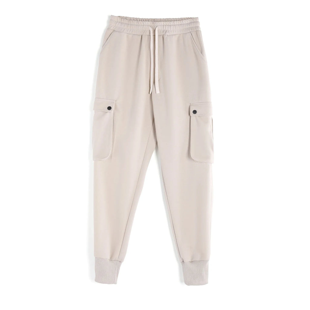 Men's loose-fit light grey cotton sports trousers with ankle tie and side pockets.