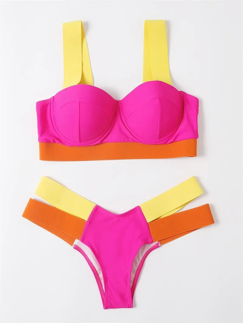 Women's rose red bikini swimsuit with black contrast trim and internal steel bracket push-up support