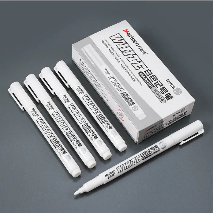 Super White Dazzling fine head painting pen with 2.8mm thick white tip, 14cm length, on dark surface