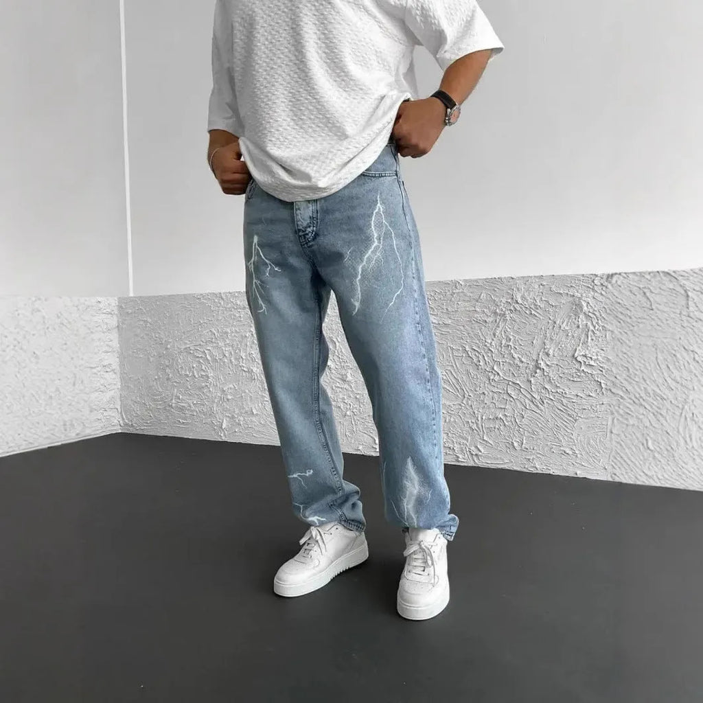 Men's straight-leg denim jeans in medium wash blue with zipper fly and mid-waist design