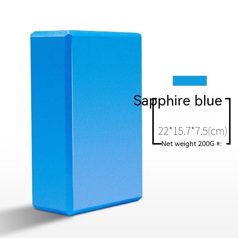 High-density EVA foam yoga block in various colours and prints on a workout mat.