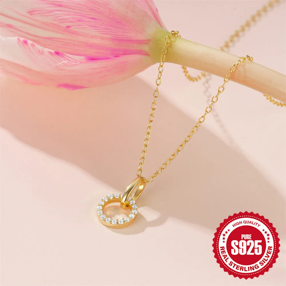 Gold-coloured S925 sterling silver adjustable clavicle chain necklace with round geometric zircon pendant.