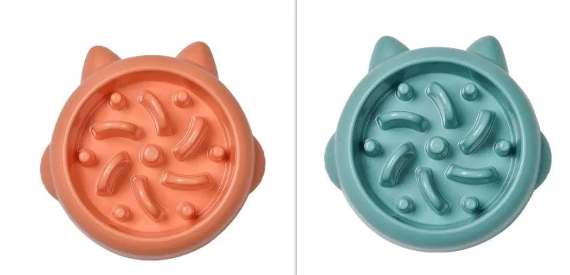 Green pet slow feeder bowl with raised bone-shaped obstacles inside to slow down eating.