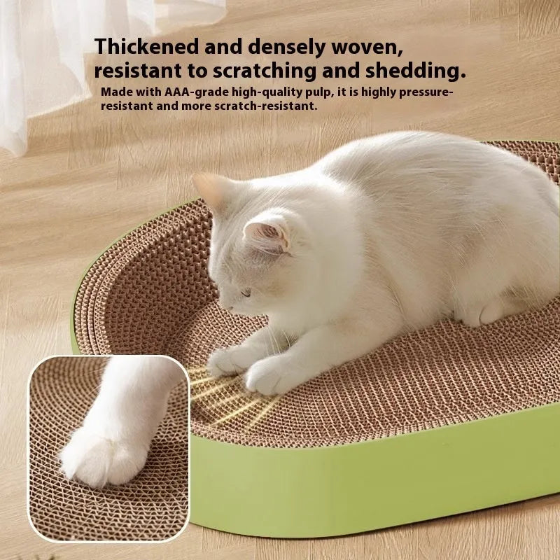 Green oval corrugated paper cat scratch board and nest, 55cm in diameter.