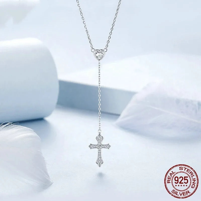 Simple silver cross necklace with V-neck pendant on O-ring chain in colour BSN384