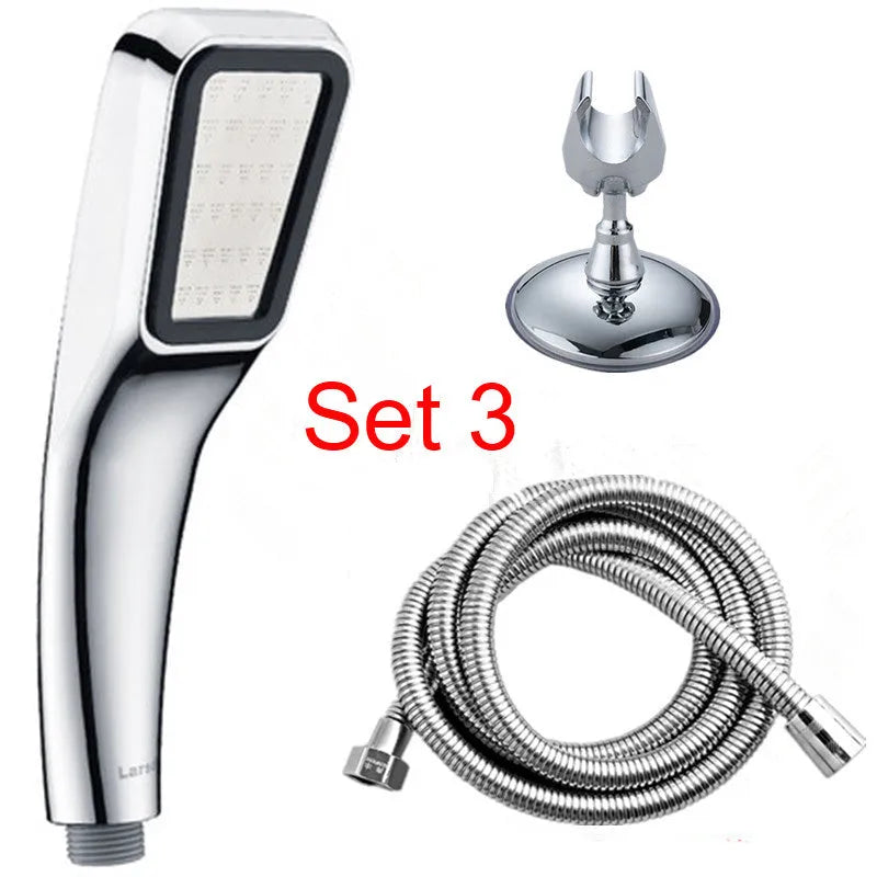 Orange hand-held rain shower set with wall bracket and connection hose