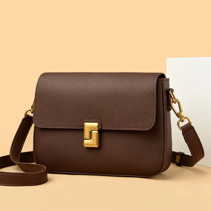 Women's genuine cowhide leather messenger retro shoulder bag in horizontal square shape, 24x7x19cm, available in black