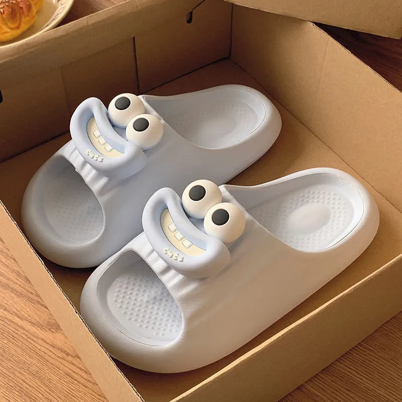 Sausage mouth slippers in light blue with soft EVA sole on wooden floor, indoor household use