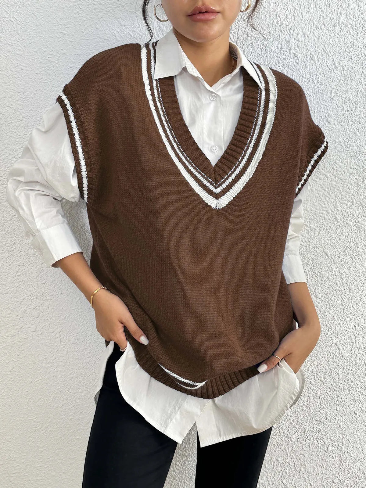 Women's college style vest sweater in acrylic polyester blend fabric, loose fit, available in black blue coffee colours