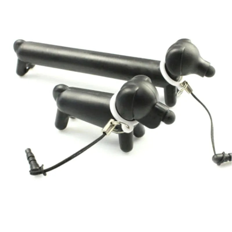 Black dog-shaped touch screen stylus showing length adjustment and phone holder function