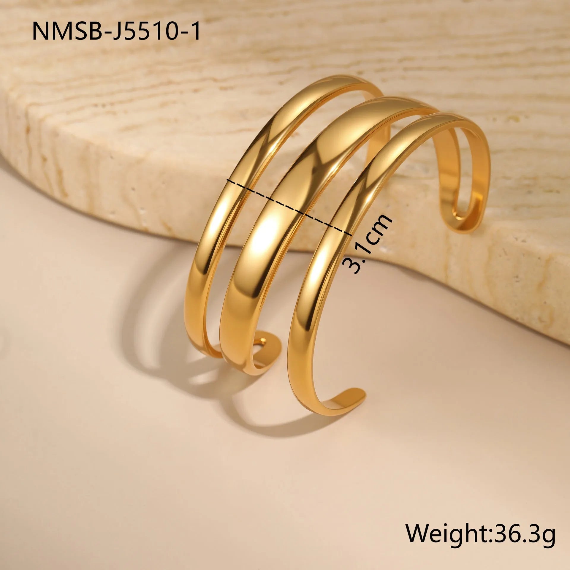 A geometric stainless steel bracelet with a simple opening clasp, shown in a gold electroplated finish.