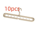 Green plastic nine-hole folding hanger for trousers displayed open and folded flat.