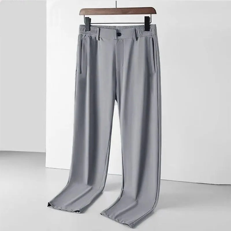Men's loose straight leg Ice Silk trousers with elastic waistband in black colour