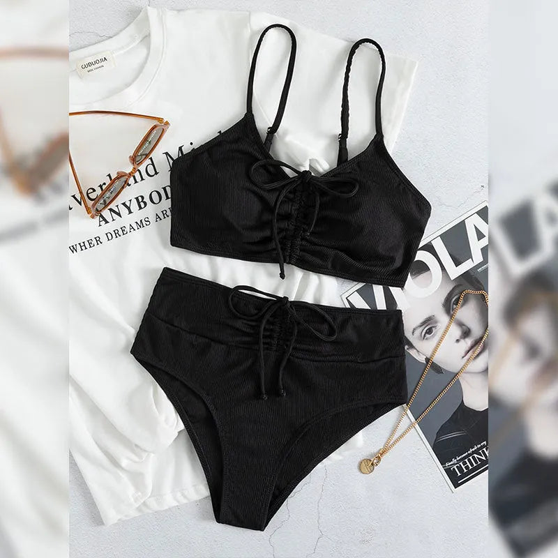 Black women's bikini swimsuit with sling split high waist shorts and sleeveless top