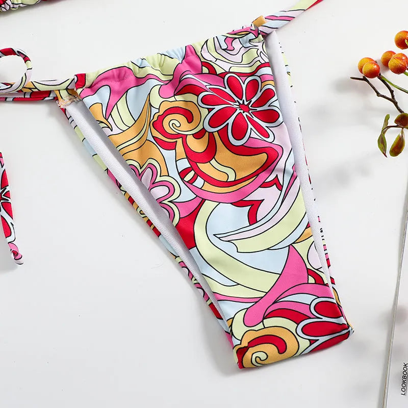 Women's triangle printed bikini with halter neck top and separate bottom in multicolour