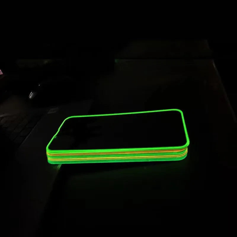 Luminous pink tempered glass screen protector fitted on an iPhone 13 Pro.