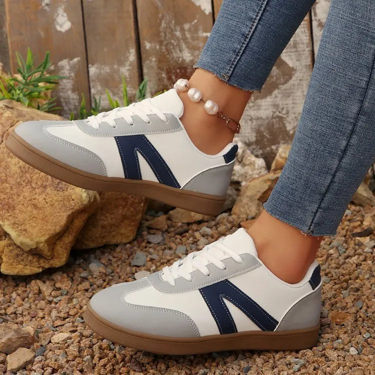 Blue women's low-top hiking shoes with artificial PU upper and rubber sole
