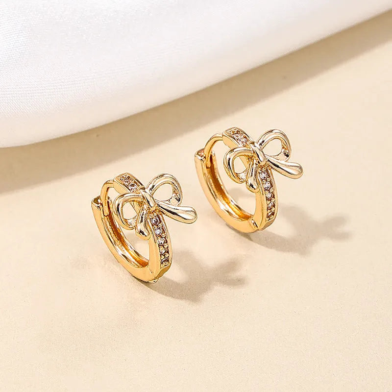 Copper earrings for women with bow and cherry shapes in gold, silver, and rose gold electroplated finishes