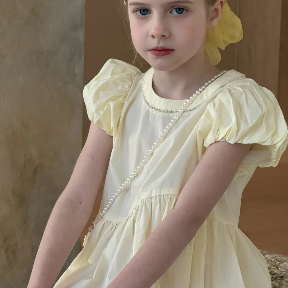 Light yellow cotton princess dress with short puff sleeves and pearl chain for girls, summer style