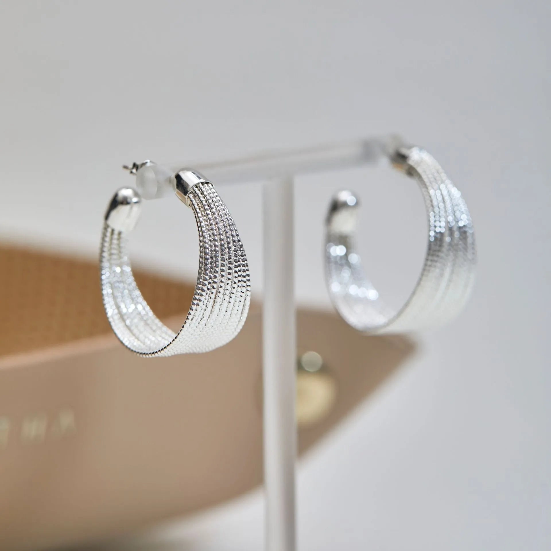 Simple geometric earrings and ear clips in silver and gold colour options