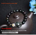 Natural obsidian zodiac bracelet in 10mm beads with national style design.