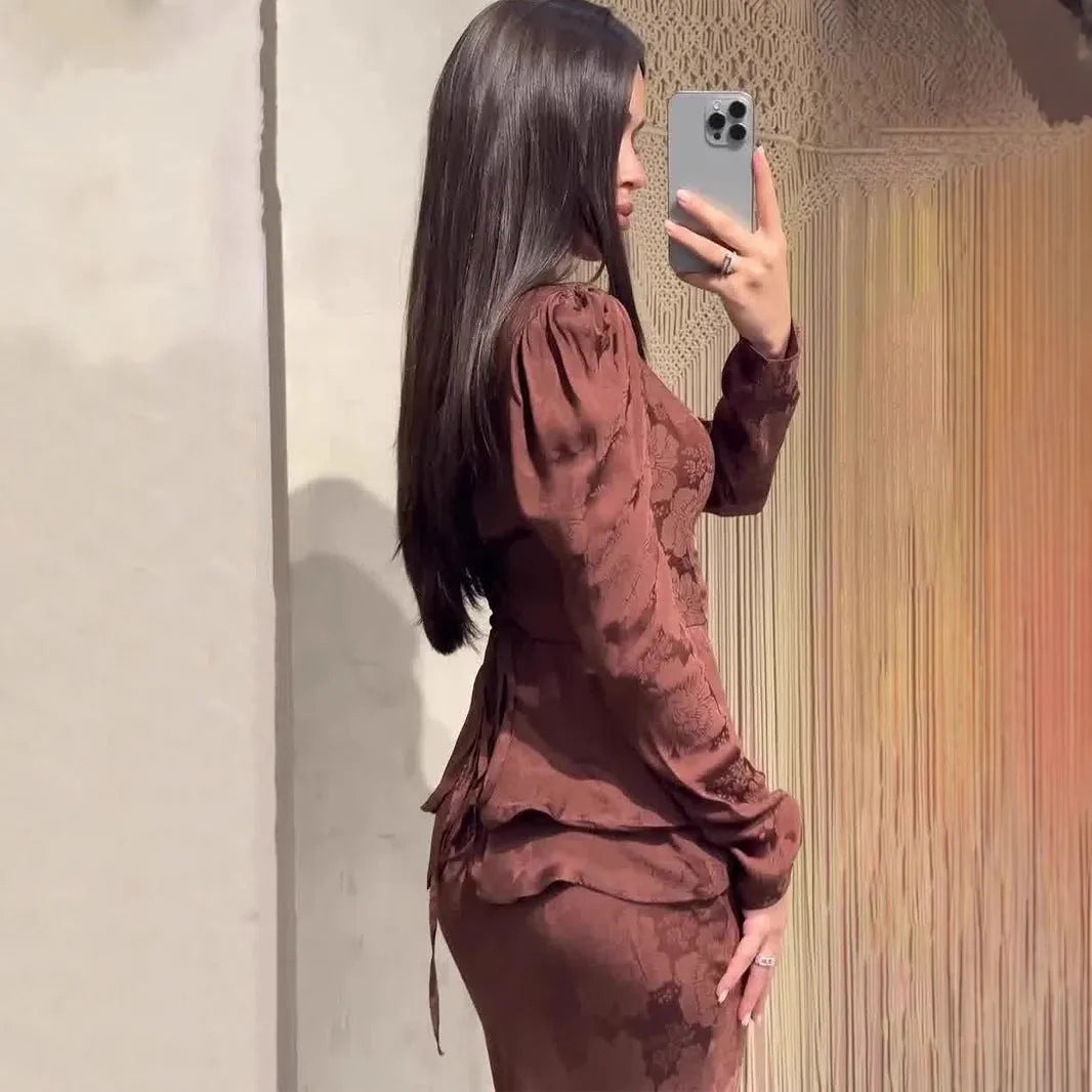 Dark brown women's retro dress with long sleeves, a fake two-piece design, and a floral pattern.