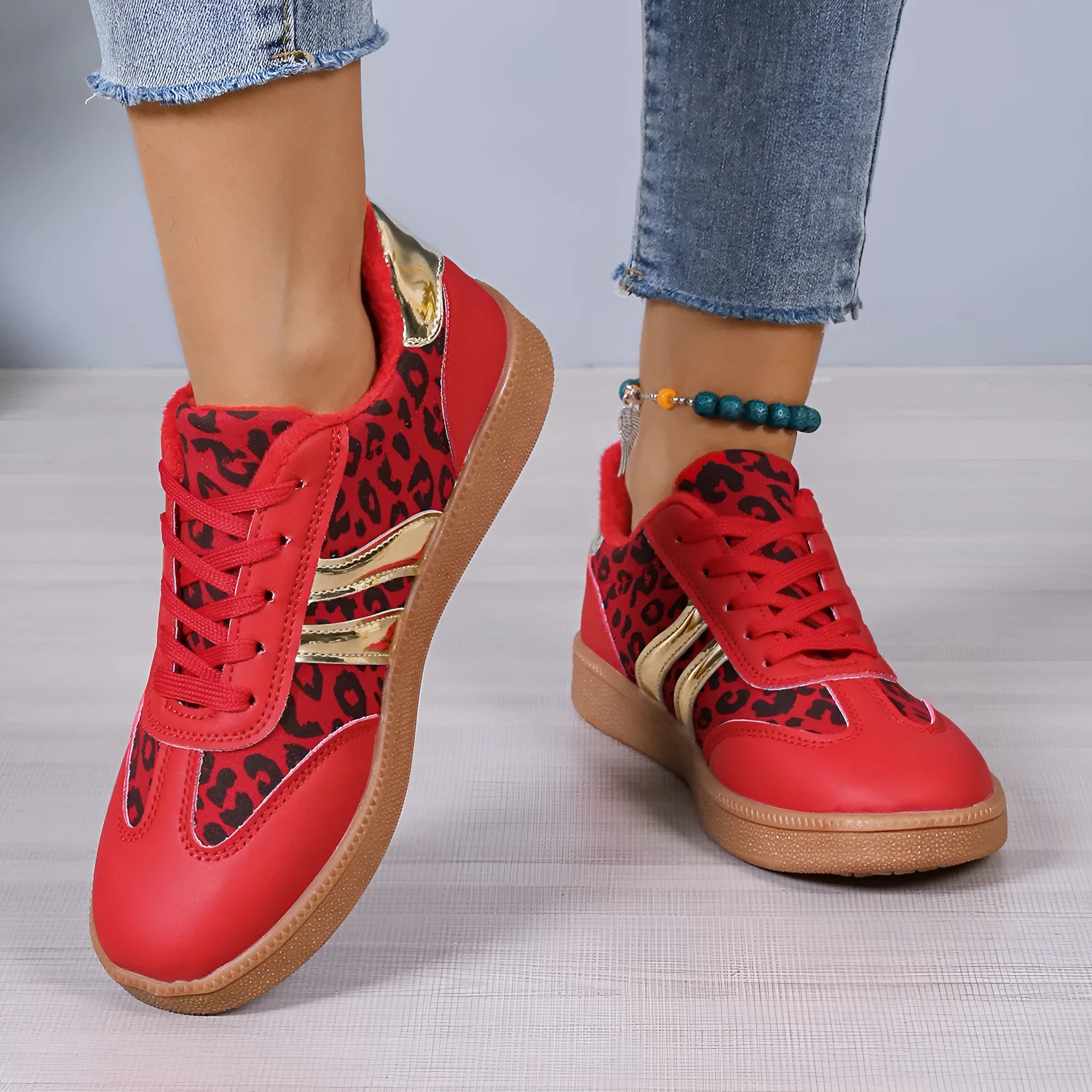 Women's casual running shoes with black microfiber upper, round toe, low top, and rubber sole against white background