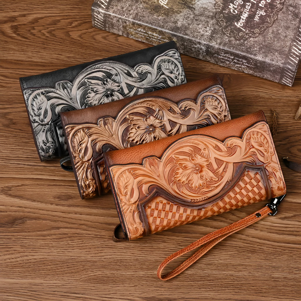 Women's brown tri-fold leather wallet with embossed floral pattern showing open compartments