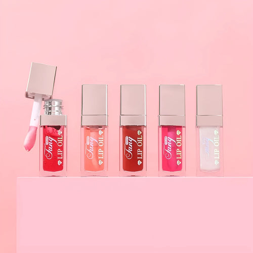 Set of five mint lipstick lip gloss tubes in shades 001, 006, 007, 012, and 015.
