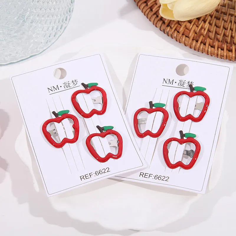 Children's plastic cartoon fruit hairpins in apple, cherry, and strawberry styles, gentle on hair