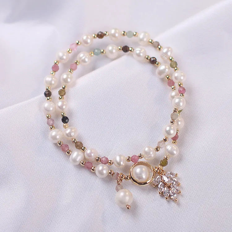 Double layer strawberry quartz bracelet with lucky cat charm and red cat's eye flowers