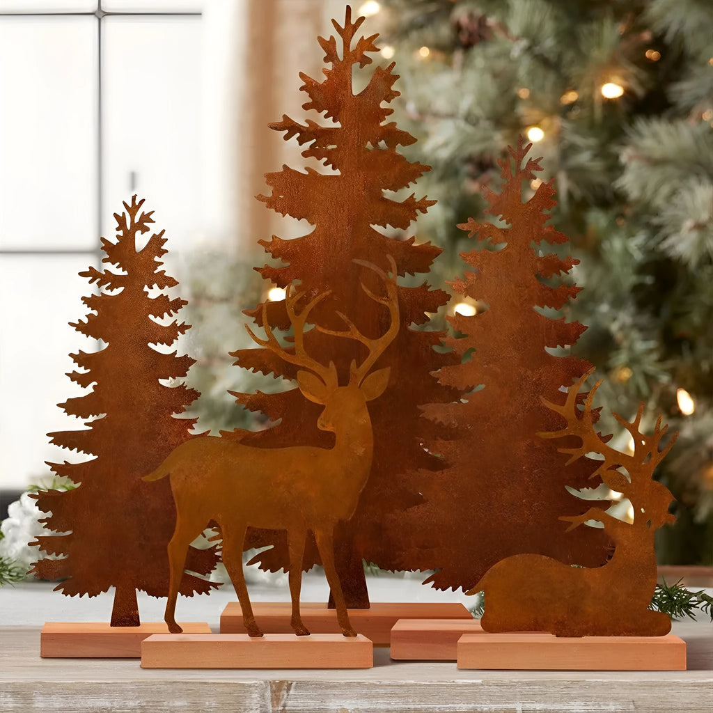 Set of three rustic iron Christmas tree and elk ornaments for holiday decor.