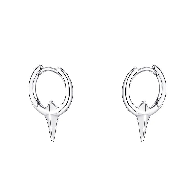 A pair of gold and white electroplated geometric star ear clips made from solid copper for women.