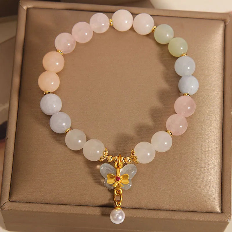 Women's crystal bracelet with colourful morganite butterfly pendant on an adjustable chain.