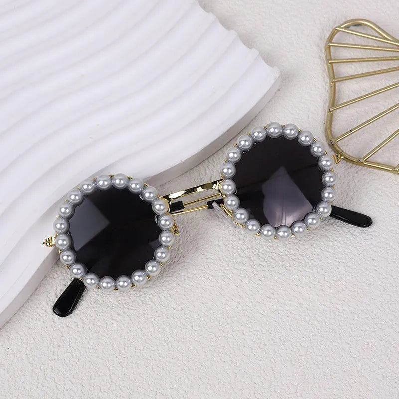 Pearl-rimmed round sunglasses for pets on cat and dog with black, blue, coffee, orange and purple colour options