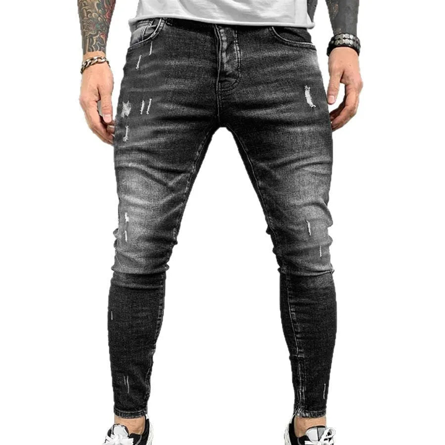 Gray ripped denim skinny pants for teenagers, cotton fabric, mid waist, zip fly, front view