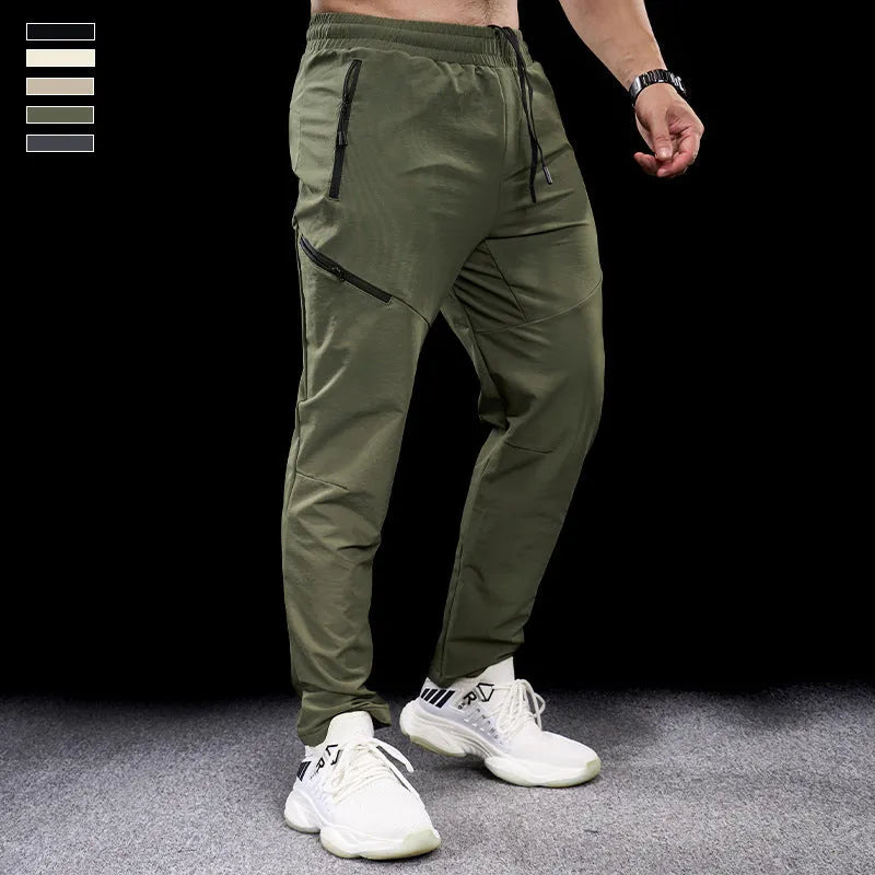 Men's waterproof workout pants in quick-drying nylon fabric for sports and fitness activities
