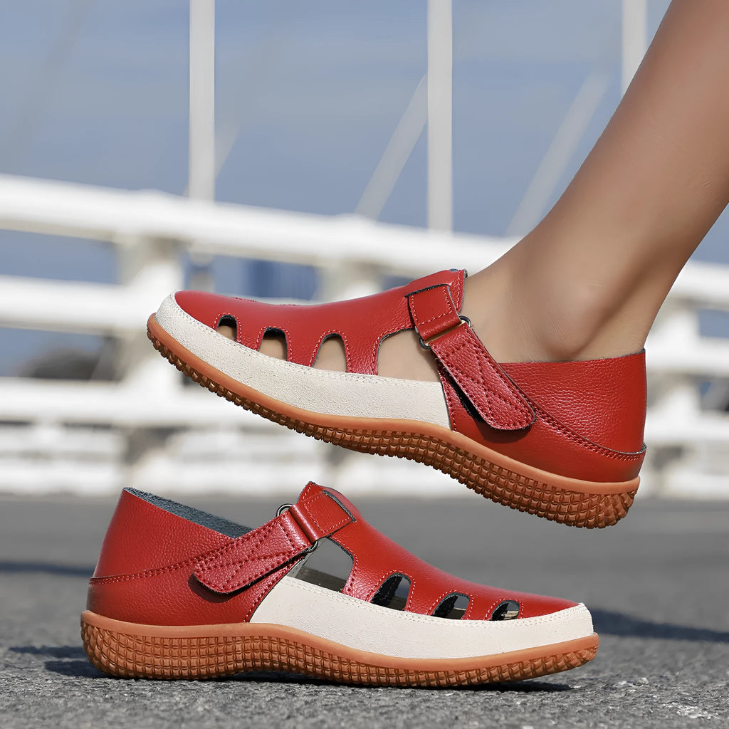 Plus size women's flat sandals with hollow-out design and toe cap in blue, red, or white.