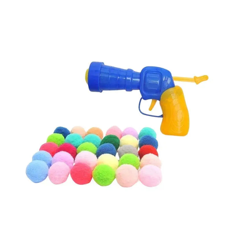 Plush pet launch gun with soft yarn balls for interactive cat and dog play sessions