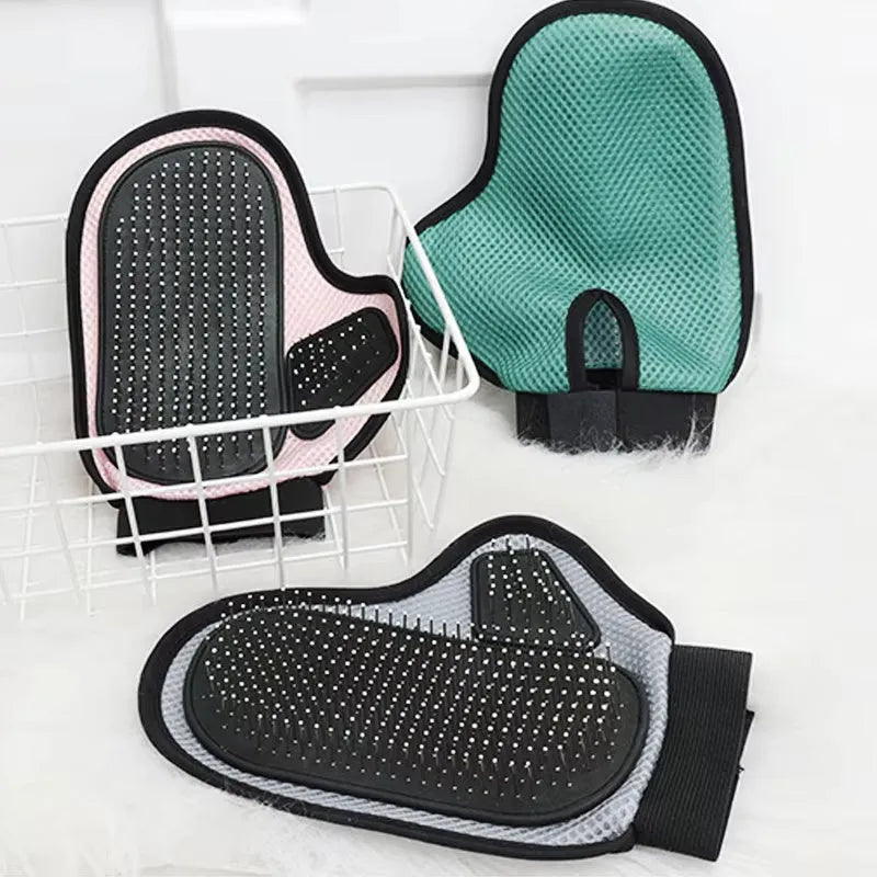 Gray pet grooming glove with silicone massage tips for removing loose cat and dog hair