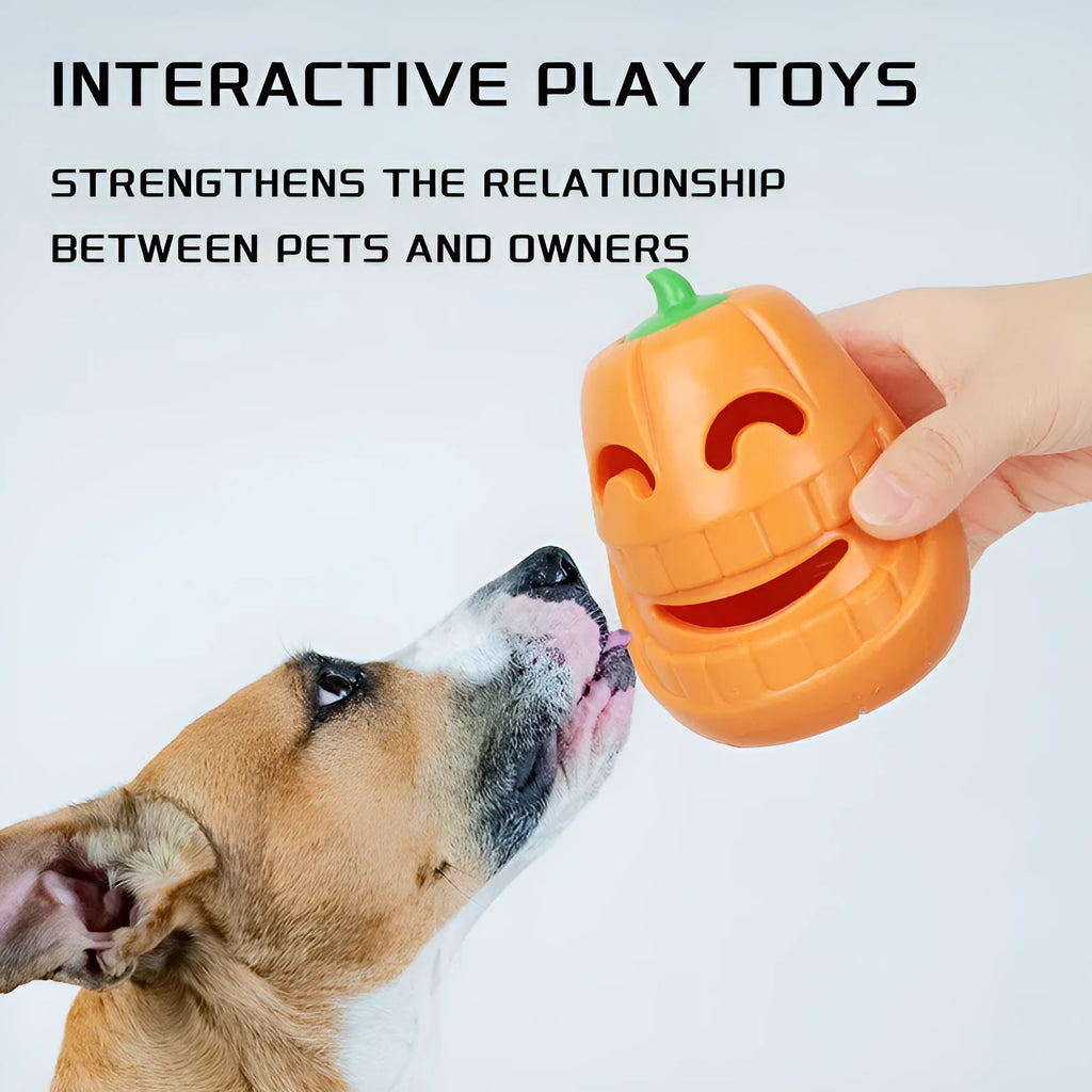 Orange Halloween pumpkin shaped rubber dog toy with a central treat-dispensing funnel.