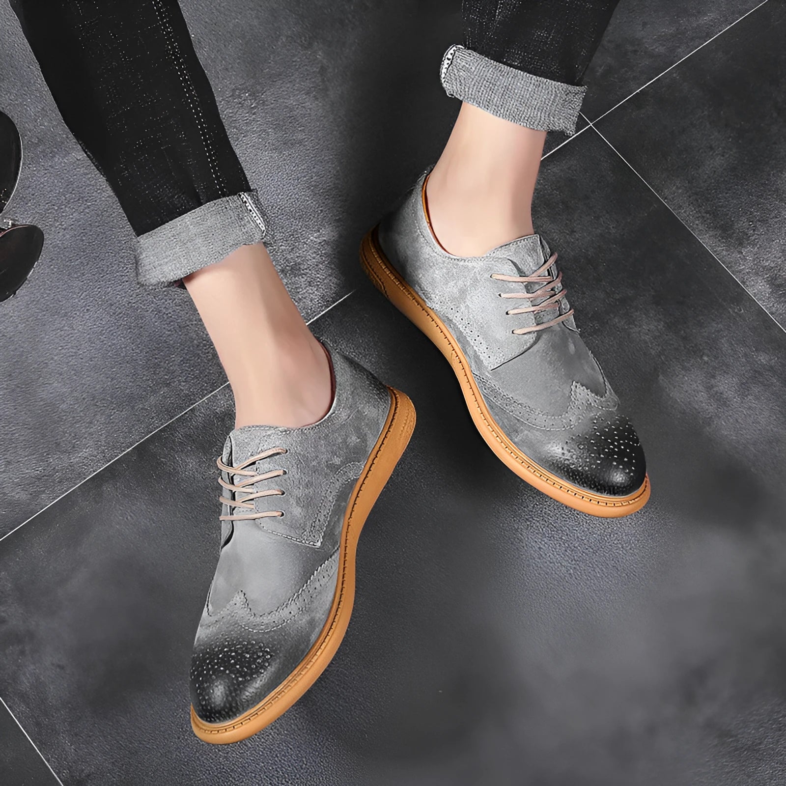 Men's black leather low-top lace-up business shoes with a rubber sole on a plain background.