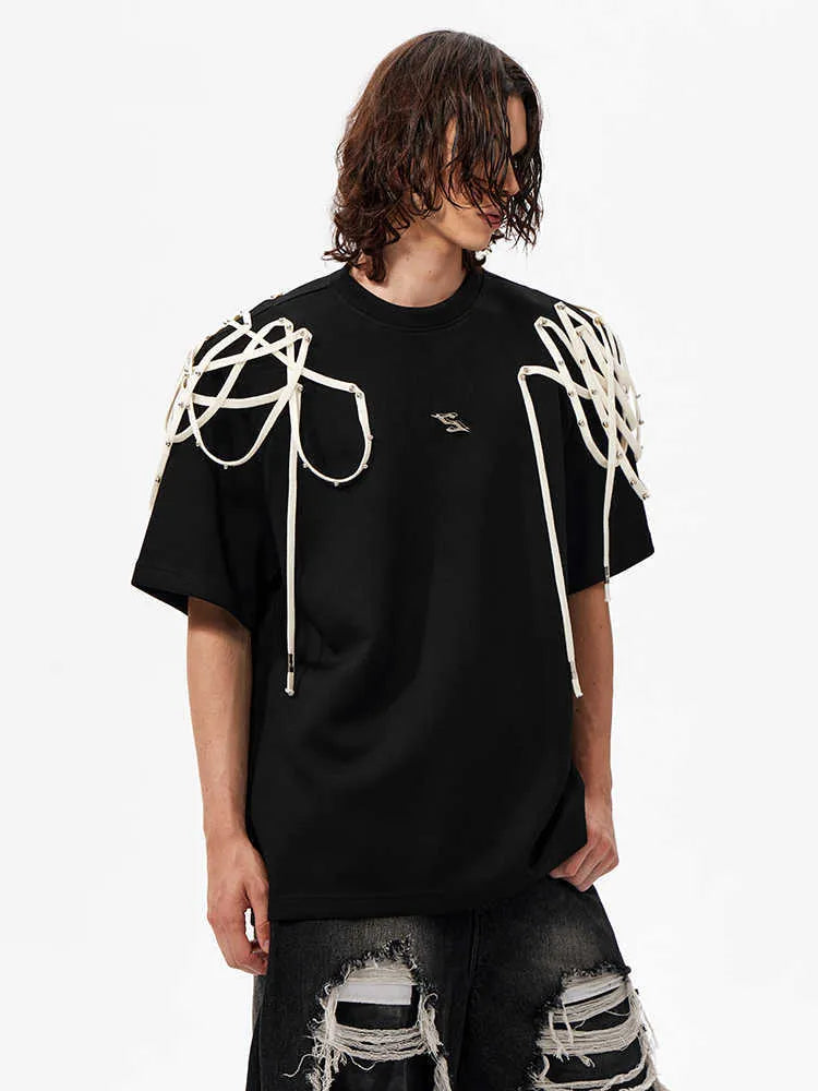 Black loose fit t-shirt with ribbon detailing on padded shoulders, short sleeves, round neck