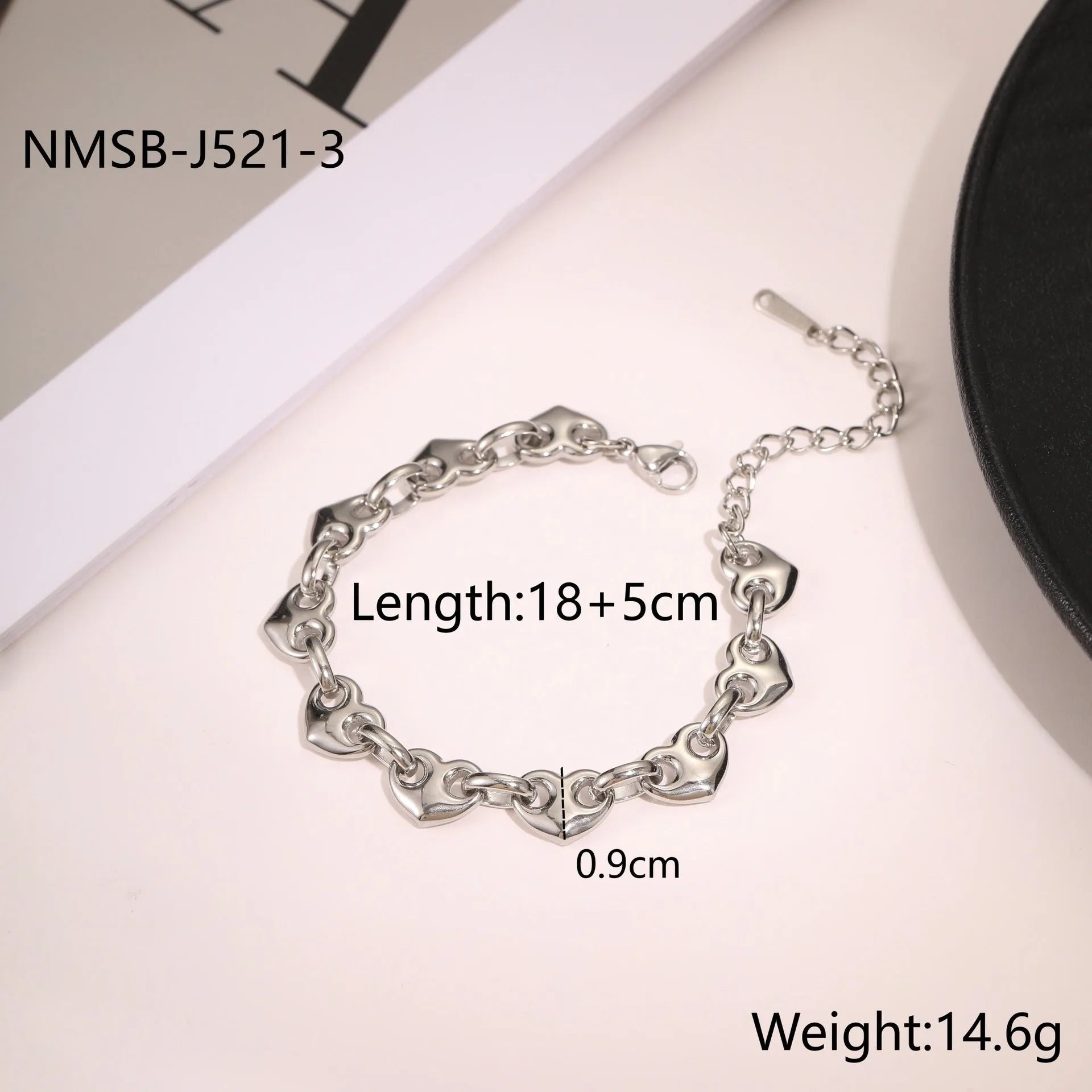 Women's hollowed-out geometric heart bracelet in gold or steel colour on stainless steel chain.