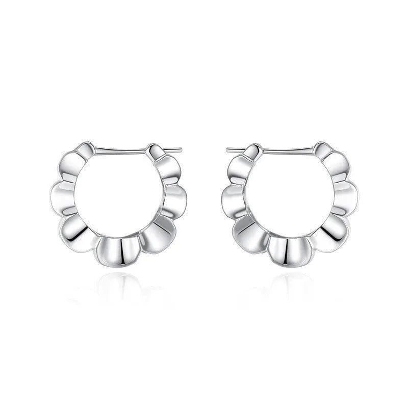Silver geometric hoop earrings with round elements and retro styling