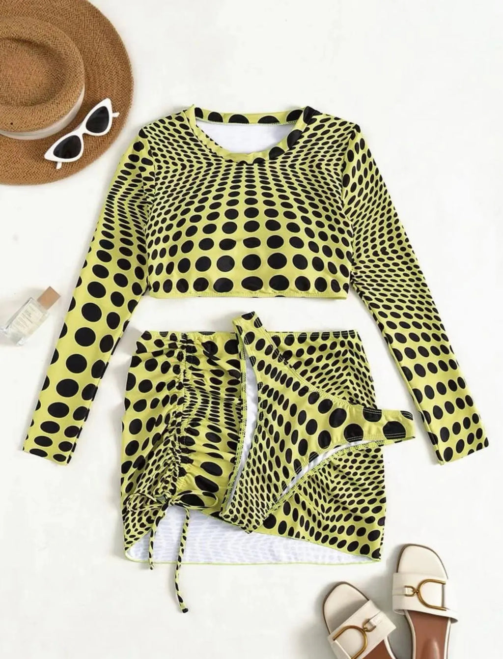 Women's green polka dot swimsuit three-piece set with matching top and skirt