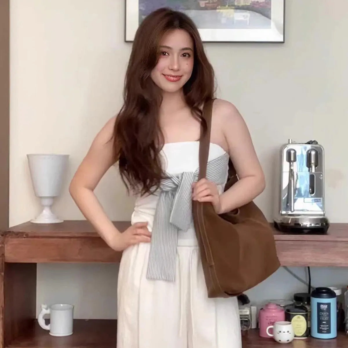 Large capacity soft suede messenger bag in coffee colour with single shoulder strap and sewing line detail